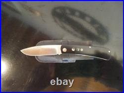 A. G. RUSSELL Vintage PocketKnife. Smooth Black Micarta withinlays. 8CR13MOV Blade