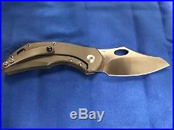 Brand New Olamic Cutlery Busker with Card and Zippered Case. M390, Titanium