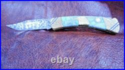 Buck 110 custom knife by Ghostown Custom Knives. Eagle Moon 025-25