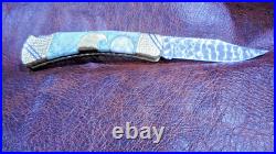 Buck 110 custom knife by Ghostown Custom Knives. Eagle Moon 025-25