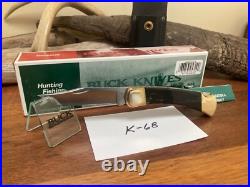 Buck Knife 110 Vintage (2003) Buffalo Scales, Filed Rocker, Box, Sheath NOS