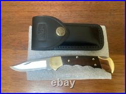 Buck Knife 112- Vintage (2000) Grooved with Old Square Frame & Sheath Clean