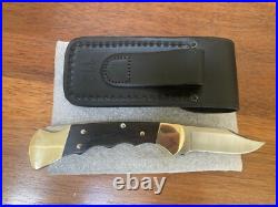 Buck Knife 112- Vintage (2000) Grooved with Old Square Frame & Sheath Clean