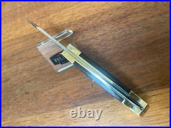 Buck Knife 112- Vintage (2000) Grooved with Old Square Frame & Sheath Clean