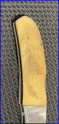 Collectible Kershaw Knife With Original Scrimshaw The Race By Sam McDowell