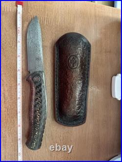 Custom Damasteel Folding Knife, Shashunder Ukrainian Knives, zirconium accents