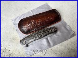 Custom Damasteel Folding Knife, Shashunder Ukrainian Knives, zirconium accents