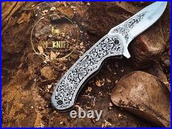 Handmade folding knife with hand engraved handle and blade