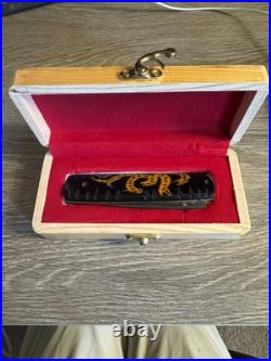 Japanese hand crafted pocket knife with a traditional dragon design and box