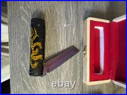 Japanese hand crafted pocket knife with a traditional dragon design and box