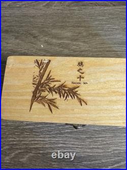 Japanese hand crafted pocket knife with a traditional dragon design and box