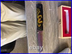 Japanese hand crafted pocket knife with a traditional dragon design and box