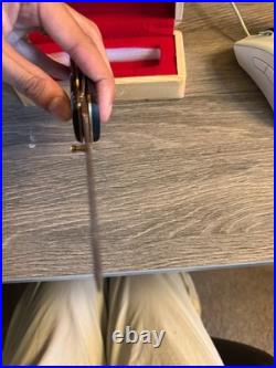 Japanese hand crafted pocket knife with a traditional dragon design and box