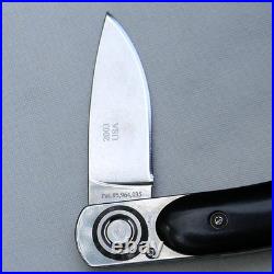 LONE WOLF, USA rare 2003 Paul Pocket Knife, black micarta handle UNUSED