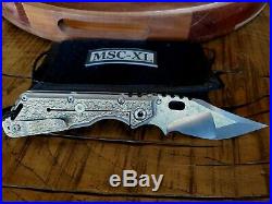 Mick Strider Custom XL Nightmare grind folding knife