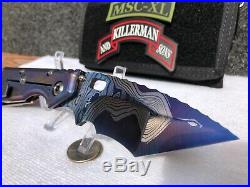 Mick Strider Custom XL San Mai Damascus folding knife