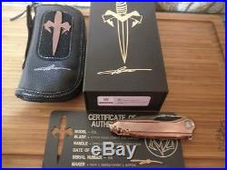 Microtech copper sigil flipper knife with bronzed hadware and damascus blade
