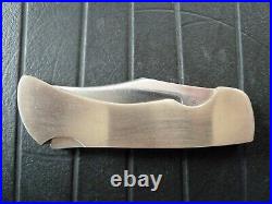 Rigid model Navajo R-37 clip point lock back folding knife