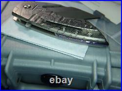 Sergey Rogovets Knives Model XR-4 Titanium Biohazard Mokuti Backspacer Knife