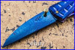 Suchat Jangtanong Custom Folding Knife Color Damascus Black Pearl Carved Spider