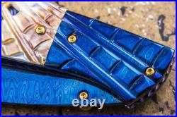 Suchat Jangtanong Custom Folding Knife Color Damascus Black Pearl Carved Spider