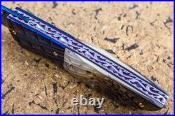 Suchat Jangtanong Custom Folding Knife Color Damascus Black Pearl Carved Spider