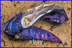 Suchat Jangtanong Custom Folding Knife Color Damascus Steel Carved as Swan Topaz