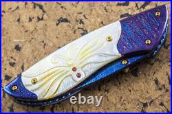 Suchat Jangtanong Custom Folding Knife Color Damascus Steel Yellow Pearl Carved