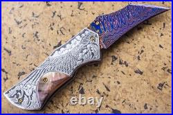 Suchat Jangtanong Custom Folding Knife Damas Steel Engraved as Bald Eagle Pearl