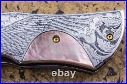 Suchat Jangtanong Custom Folding Knife Damas Steel Engraved as Bald Eagle Pearl