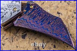 Suchat Jangtanong Custom Folding Knife Damas Steel Engraved as Bald Eagle Pearl