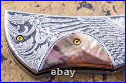 Suchat Jangtanong Custom Folding Knife Damas Steel Engraved as Bald Eagle Pearl