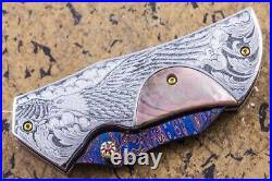 Suchat Jangtanong Custom Folding Knife Damas Steel Engraved as Bald Eagle Pearl