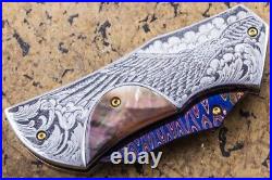 Suchat Jangtanong Custom Folding Knife Damas Steel Engraved as Bald Eagle Pearl