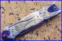 Suchat Jangtanong Custom Handmade Folding Knife Color Damascus Black Lip Pearl