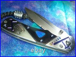 Titanium Blue Opal Benchmade Knife after Sebenza with Chris Reeves lanyard $895