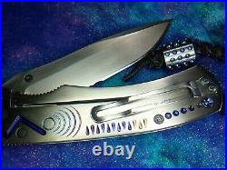 Titanium Blue Opal Benchmade Knife after Sebenza with Chris Reeves lanyard $895