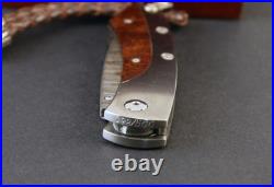 William Henry Copper Damascus Pikatti Folding Knife