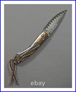 William Henry Handcrafted Folding Knife, B12 Amber Butte, Mokume, Damascus