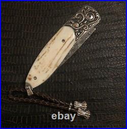 William Henry Knife B05 Monarch MCKINLEY 18k Gold, Walrus Fossil & Rubies 18/25