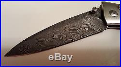 William Henry knife Rob Thomas Damascus, hand carved silver inlay. Custom