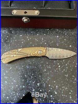 William henry knife model B09 1107 Ingot. Wave pattern
