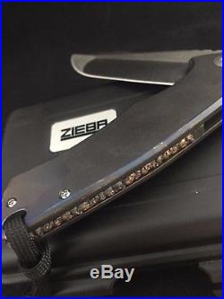 Zieba Custom Knives, S1 Angel Wing, Blue Anodized, Skull Backspacer, M390